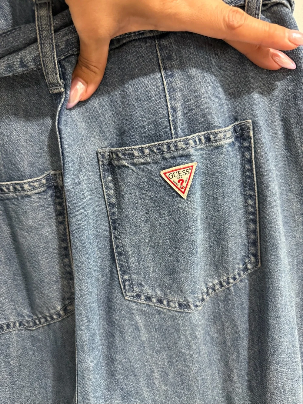 Guess Sleeveless Denim Jumpsuit in Light Blue Wash